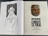 a book with a drawing of a man in a hat
