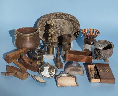 a lot of antique items that are on a blue surface