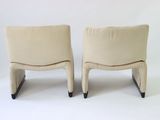 pair of mid - century modern lounge chairs in the style of pierre proupe, france, 1970s