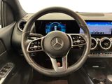 the interior of a car with a steering wheel and dashboard controls