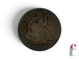 a close up of a coin with a woman sitting on it