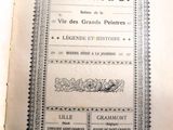 un vieux livre ouvert sur une table