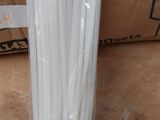 a bunch of white plastic straws sitting on a table