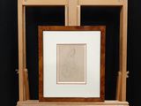 a picture of a picture of a woman on a easel