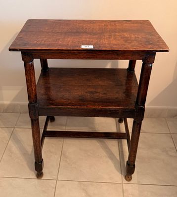 a small wooden table with a shelf on top of it