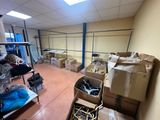 a room with a lot of boxes and boxes on the floor