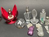 a lot of glass bottles that are sitting on a table