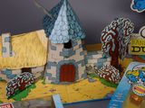 a smurf ' s house made out of cardboard
