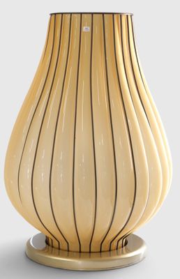 an image of a yellow vase with a black stripe on it