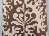 the cover of a magazine with a brown and white pattern on it