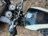 a motorcycle that is parked on the side of the road