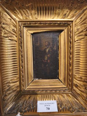 une image d'un tableau dans un cadre doré