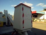 a white truck with a red stripe on the back of it