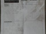 a piece of paper that has been left on the floor