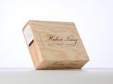 the wooden box is empty and ready to be used as a gift