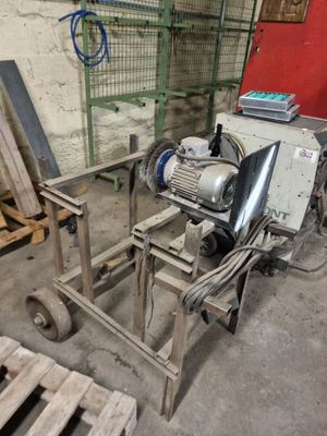 a machine that is sitting on a cart in a room