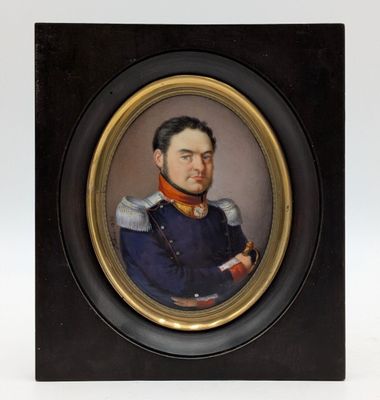 portrait of a man in a military uniform in a black frame