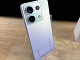 the back of an iphone 11 with a camera attached to it