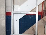 a ladder that is leaning against a wall in a room