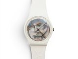 an image of a close up of a watch on a white surface