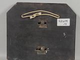 a black box with a rope on top of it