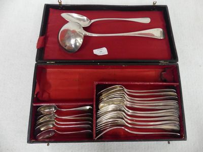 silverware in a red case on a white table cloth