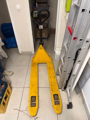 a fork lift in the middle of a room