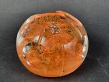 a glass ball that has a small hole in it