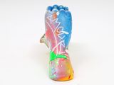 a small figurine of a foot that is painted with colorful paint