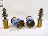 three different types of lamps on a white surface