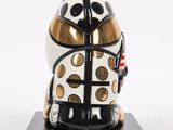 a black and white statue of a ladybug on a black base