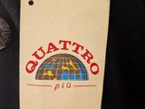 a tag that says quatro on it hanging from a jacket