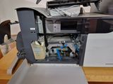 a printer that is sitting on top of a table
