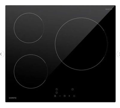 a black stove top with three burners and three burners