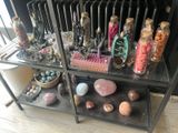 a shelf that has many different types of rocks on it