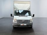 a white truck that is parked in a room