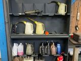 a shelf that has a lot of items on it
