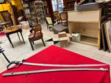 a large pair of scissors on the floor in a room