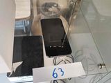 a picture of a cell phone on display in a glass case