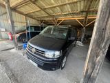 a black van that is parked in a garage