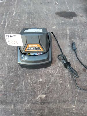 a charger that is sitting on the ground next to a charger