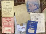 a lot of papers and pamphlets sitting on the floor