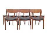 set of six danish teak dining chairs with black leather seats