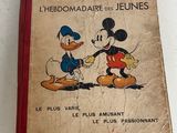 un vieux livre avec Mickey Mouse et Pluto, Pluto, Pluto, Pluto, Pluto, Pluto, Pluto, Pluto, Pluto, Pluto, Pluto, Pluto, Pluto