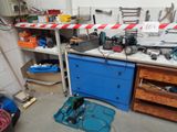 a workbench with tools on it in a garage