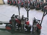 many different types of scooters lined up in a room