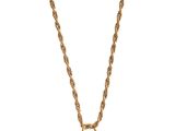 un collier en or avec un pendentif en pierre blanche au bout d'une chaîne