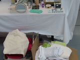 a table with a lot of items on it in a room