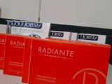 three boxes of radiante are lined up on a table