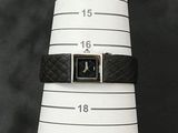 a picture of a wrist watch with a black leather band